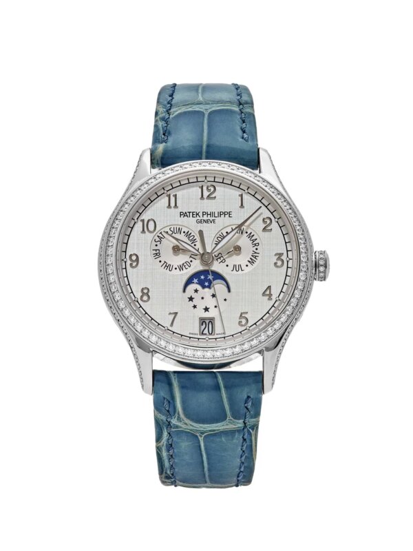 Patek Philippe Complications 4947G-010 Annual Calendar White Gold Silver Dial.