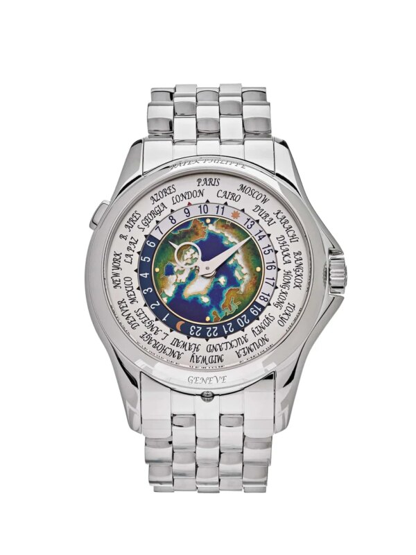 Patek Philippe Complications World Time 5131/1P-001 in platinum with a blue guilloché dial, displaying world time zones and featuring a platinum bracelet.