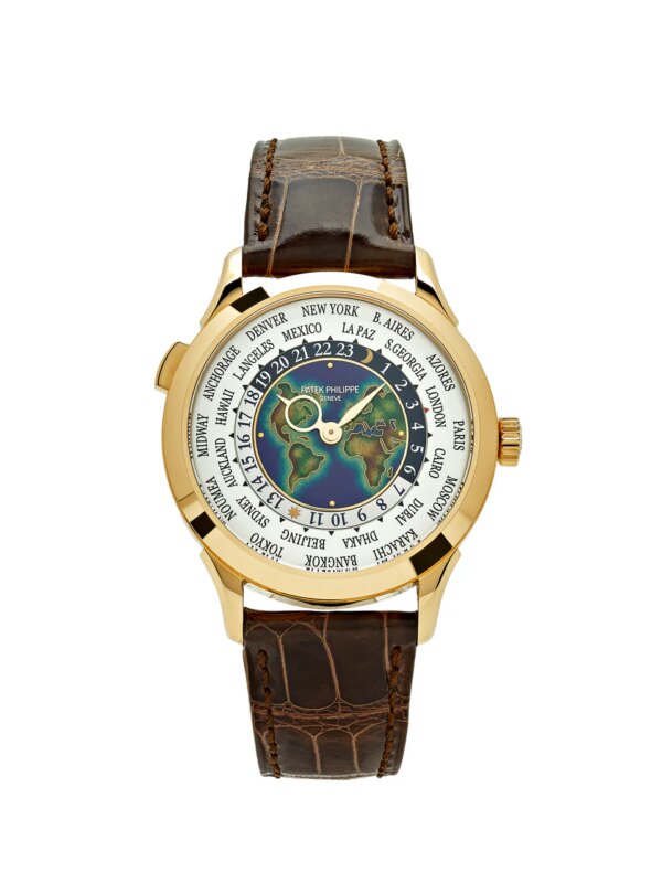 Patek Philippe Complications World Time Yellow Gold 5231J-001 with a blue hand-guilloché dial, 18k yellow gold case, and brown alligator leather strap.