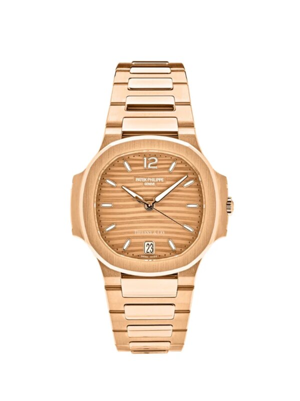 Patek Philippe Ladies Nautilus 7118/1R-010 in 35mm rose gold, featuring an elegant dial, rose gold bracelet, and timeless design.