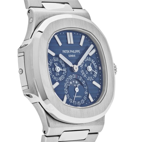 Left view of the Patek Philippe Nautilus Perpetual Calendar Tiffany & Co. Blue Dial 5740/1G-001 with 18k white gold case, blue dial, and integrated Perpetual Calendar complications.