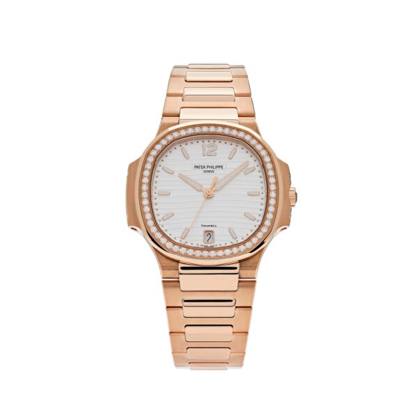 Patek Philippe Nautilus 7118/1200R-001 with 35mm rose gold case, Tiffany & Co. dial, diamond-set bezel, and rose gold bracelet.