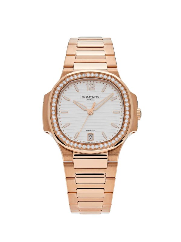 Patek Philippe Nautilus 7118/1200R-001 with 35mm rose gold case, Tiffany & Co. dial, diamond-set bezel, and rose gold bracelet.