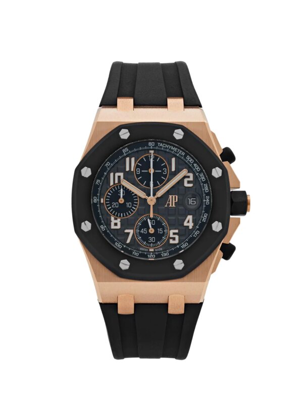 Experience the Audemars Piguet Royal Oak Offshore 26238OK.OO.A002CA.01 Chronograph. Crafted in 42mm rose gold, featuring a black 'Grande Tapisserie' dial, and paired with a black rubber strap.