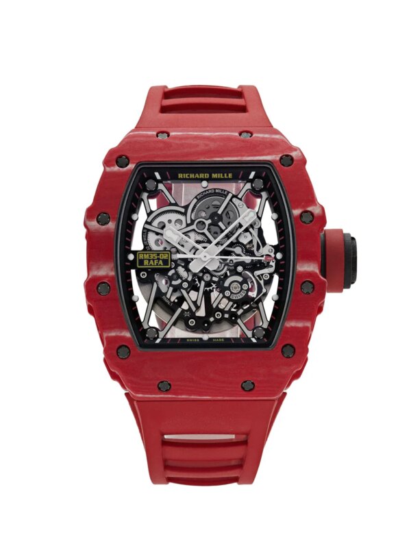 Richard Mille Rafael Nadal RM 035-02 with a red NTPT carbon case, skeletonized dial, and red rubber strap, showcasing sporty elegance and cutting-edge watchmaking technology.