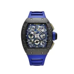 Richard Mille RM 011 Felipe Massa '10th Anniversary' with carbon NTPT case, blue and yellow accents, flyback chronograph, and skeletonized sapphire dial.
