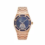 Audemars Piguet Royal Oak 26521OR.SS.1220OR.01 ‘Extra Thin’ Tourbillon in rose gold with a blue petite tapisserie dial, baguette-cut blue sapphire hour markers, and a tourbillon at 6 o'clock.