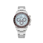 Rolex Daytona 116506 with a 40mm platinum case, ice-blue dial, luminous Chromalight hands, sub-dials, and a tachymetric brown bezel on a platinum Oyster-style bracelet.