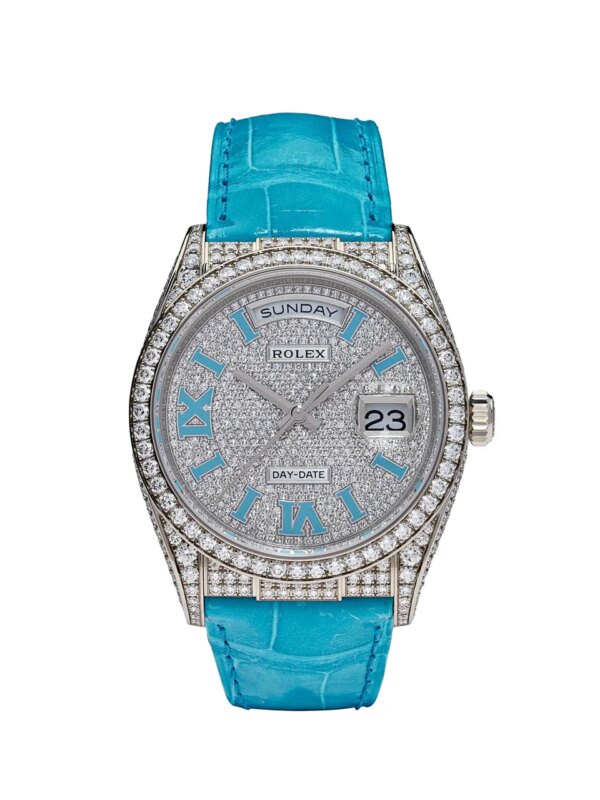 Rolex Day-Date 128159RBR White Gold Diamond Roman Dial with Turquoise Leather Strap and Gem-Set Bezel.