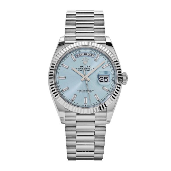 Rolex Day-Date 128236 platinum watch with an ice blue dial and baguette-cut diamond hour markers.