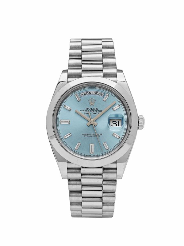 Rolex Day-Date 228206 platinum watch with an ice-blue dial and diamond hour markers.