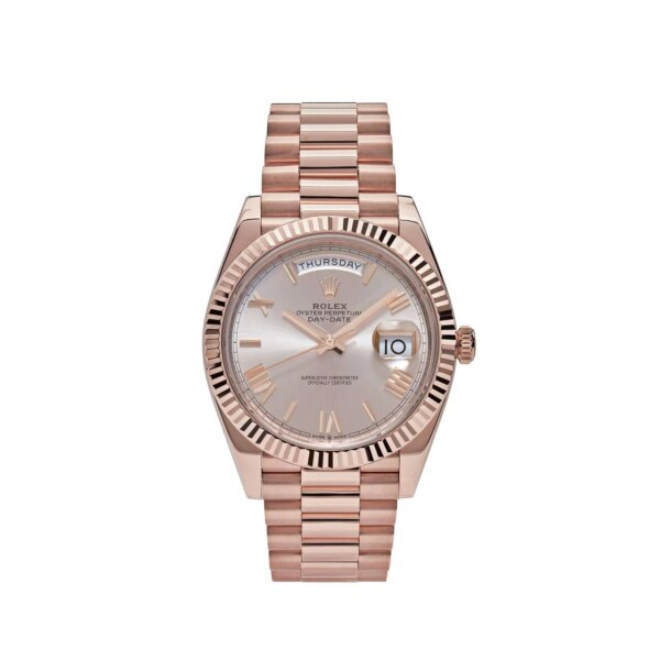 Rolex Day-Date 228235 Rose Gold Sundust Roman Dial - 40mm 18k rose gold case, sundust dial with Roman numerals, fluted bezel, and Presidential bracelet.