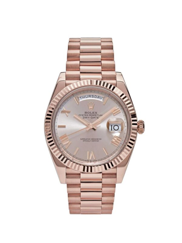 Rolex Day-Date 228235 Rose Gold Sundust Roman Dial - 40mm 18k rose gold case, sundust dial with Roman numerals, fluted bezel, and Presidential bracelet.