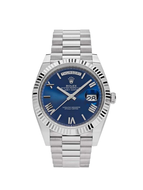 Rolex Day-Date 228239 White Gold Blue Dial 2023 - 40mm 18ct white gold case, blue dial with Roman numerals, fluted bezel, and Presidential bracelet.