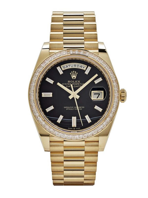 Rolex Day-Date 228398TBR yellow gold watch with onyx dial, baguette diamond hour markers, and diamond-set bezel.