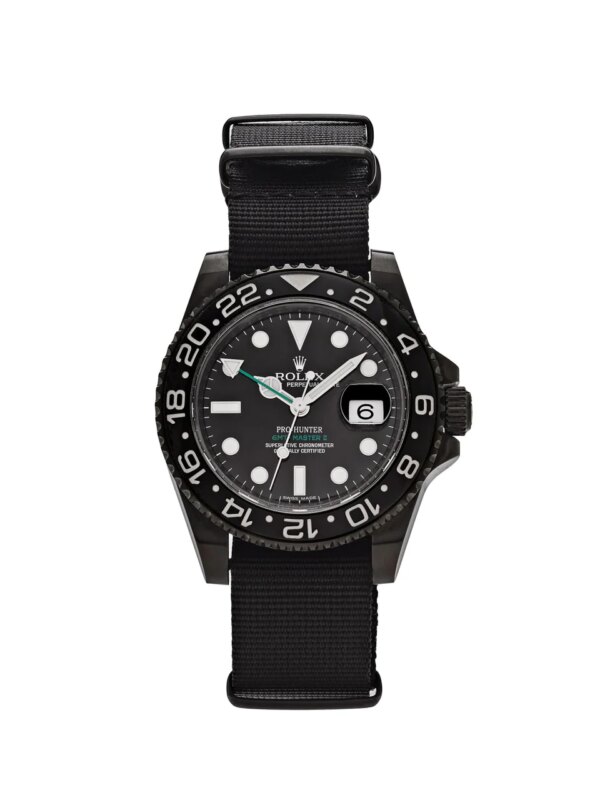 Rolex GMT-Master II 116710LN Pro Hunter "Stealth" with black-PVD-coated steel, black dial, green GMT hand, and black Cerachrom bezel, on a PVD-coated Oyster bracelet.