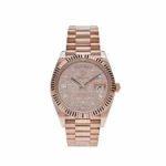Rolex Day-Date 40 Rose Gold Diamond-Paved Dial with Baguette Diamonds and Fluted Bezel.