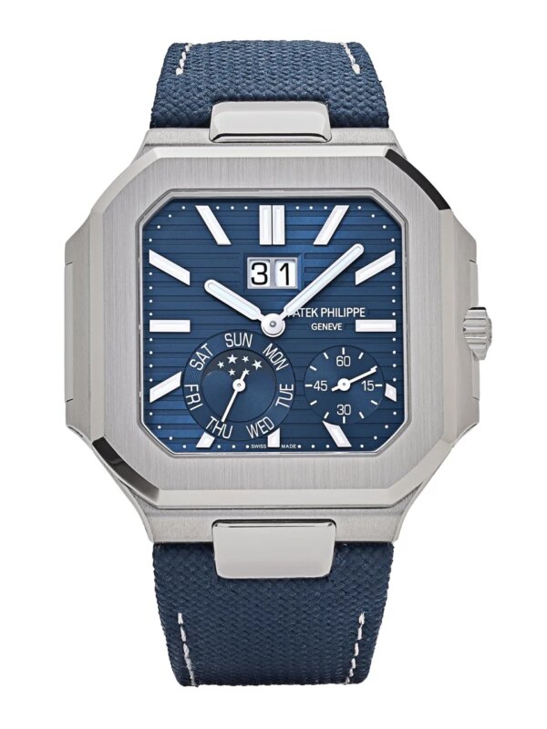 Patek Philippe Cubitus 5822P-001 in platinum with a blue sunburst dial, square case, grand date, moon-phase complications, and a navy blue composite strap.