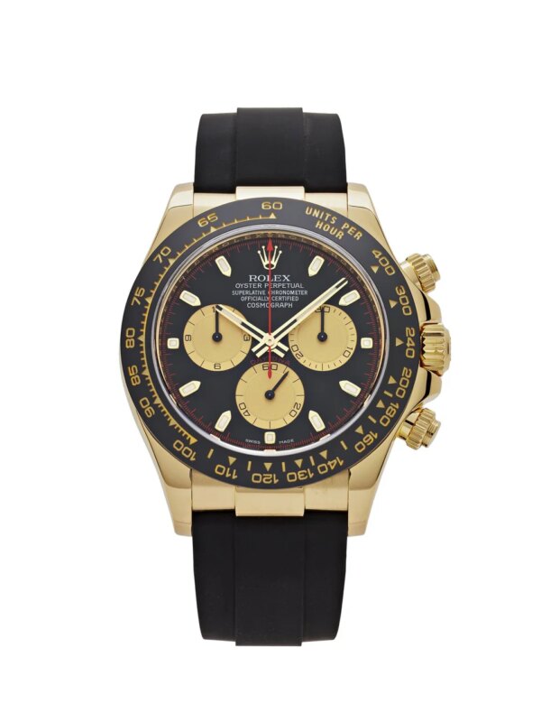 Rolex Daytona 116518LN in 18k yellow gold with black Cerachrom bezel, black dial, and gold 'Paul Newman' sub-dials on an Oysterflex strap.