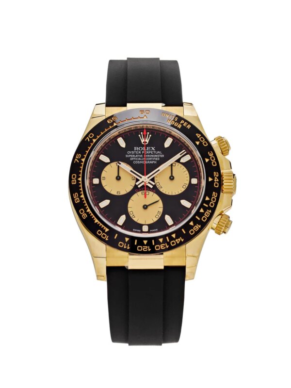 Rolex Daytona 116518LN in yellow gold with black Cerachrom bezel, black dial, gold sub-dials, and black rubber Oysterflex strap.