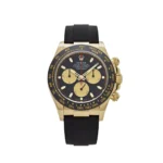 Rolex Daytona 116518LN in 18k yellow gold with black Cerachrom bezel, black dial, and gold 'Paul Newman' sub-dials on an Oysterflex strap.
