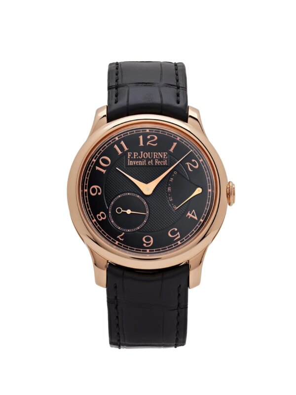 F.P. Journe Chronomètre Souverain Boutique Edition watch with a 40mm rose gold case, black dial, brown leather strap, and exhibition case back showcasing Calibre 1304.